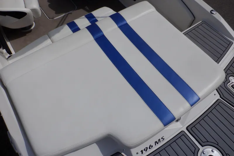 Slide: The Image of Deck of 2014 Monterey 196MS boat with gray non-slip surface and metal hinges. - 33