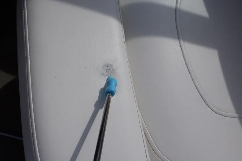 Slide: The Image of White leather seat in 2014 Monterey 196MS boat interior. - 36