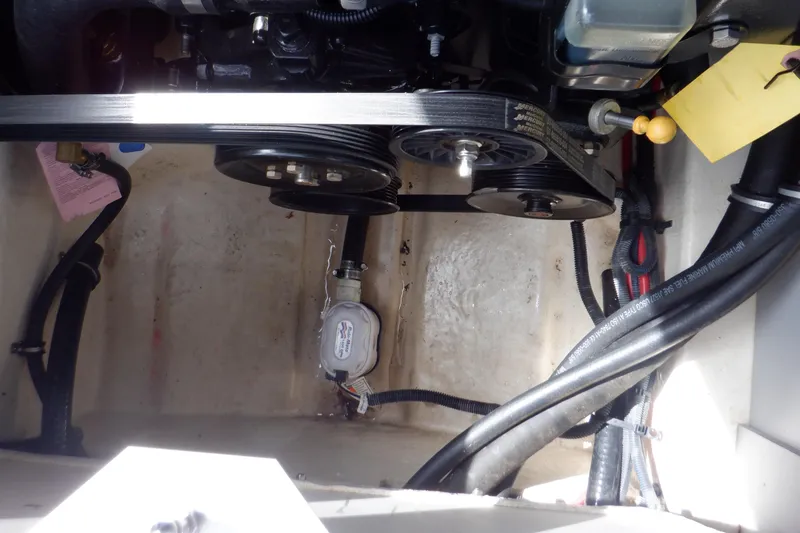 Slide: The Image of Engine of a 2014 Monterey 196MS boat, showcasing detailed components and layout. - 40