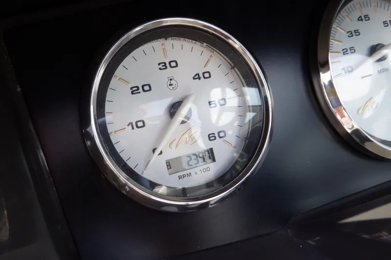 Slide: The Image of Engine compartment of a 2014 Monterey 196MS boat, showing belts and wiring. - 41