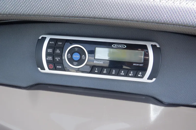 Slide: The Image of Steering wheel and dashboard of a 2014 Monterey 196MS boat. - 44