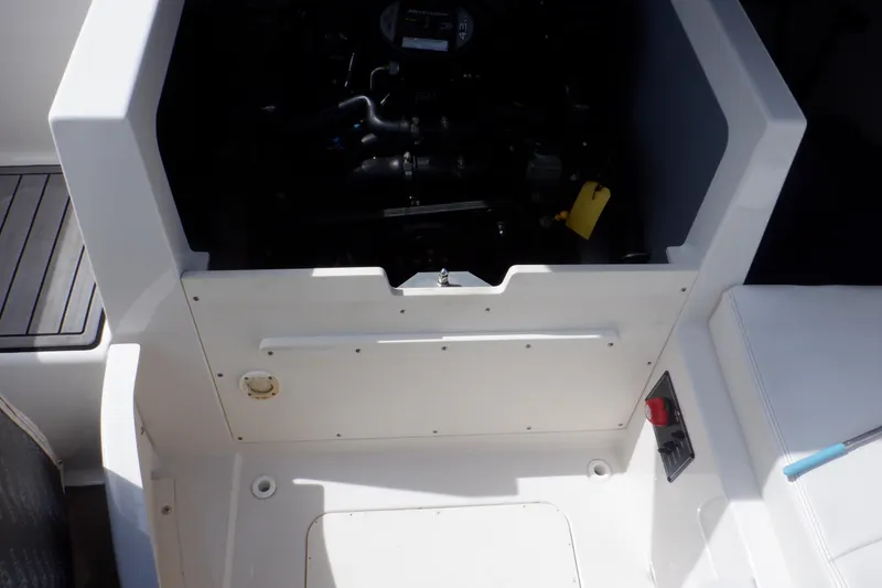 Slide: The Image of Battery switch panel on a 2014 Monterey 196MS boat interior. - 46