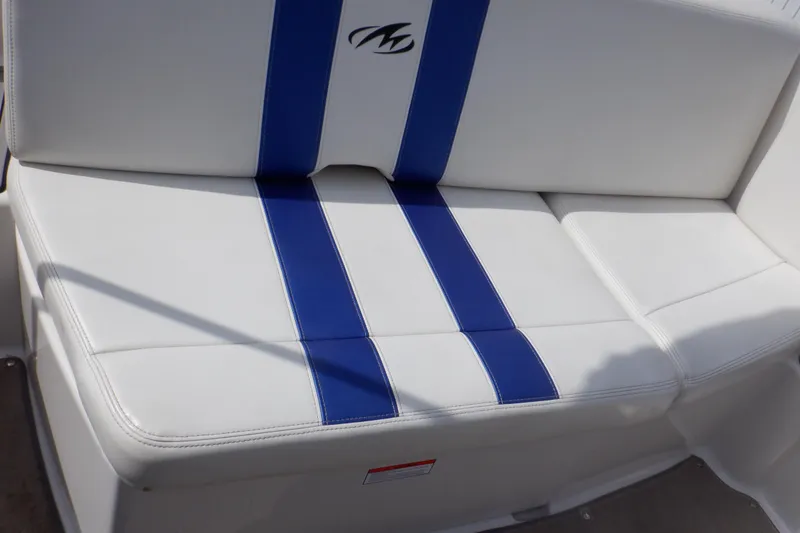 Slide: The Image of 2014 Monterey 196MS boat seat with blue stripes and logo. - 48