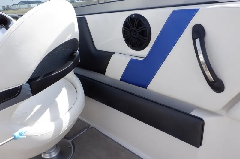 Slide: The Image of White and blue seat on 2014 Monterey 196MS boat. - 49