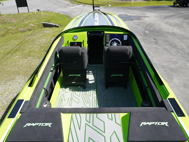 Slide: The Image of 2025 Velocity Raptor boat interior with sleek design and dual seating. - 7