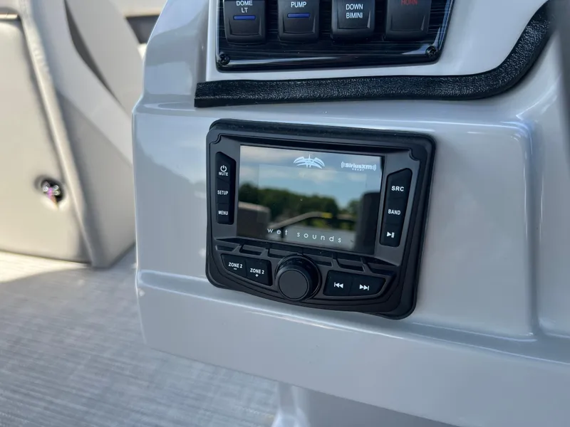 Slide: The Image of Control panel of 2025 Starcraft SLS 3 boat with audio system display. - 9