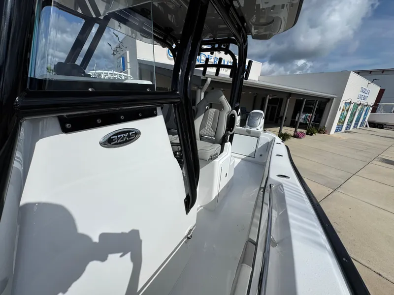 Slide: The Image of 2025 Cape Horn 32 XS boat exterior with sleek design and modern features. - 21