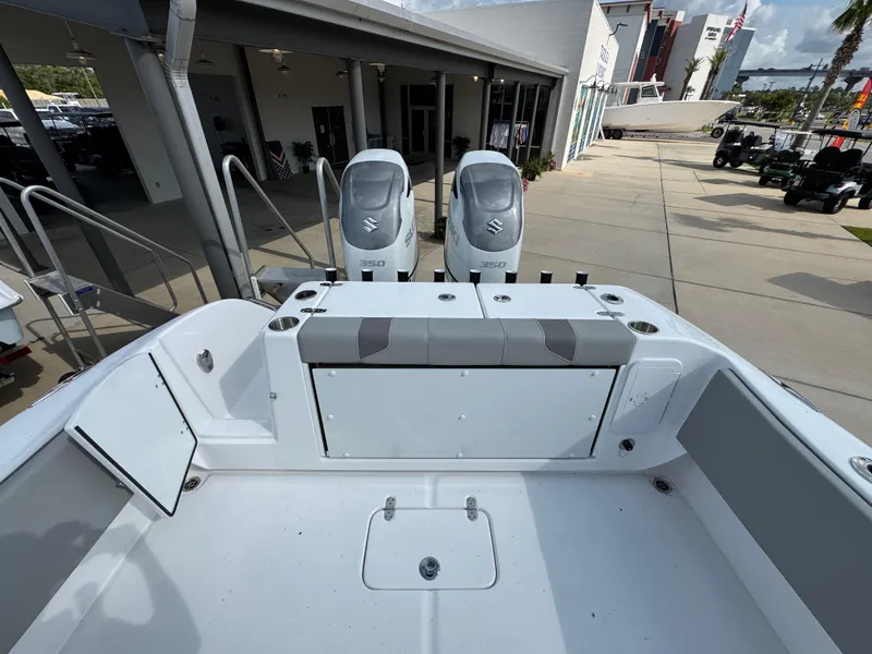 Slide: The Image of 2025 Cape Horn 32 XS boat with dual engines, docked at a marina. - 31