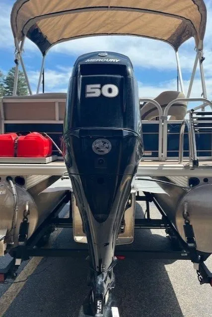 Slide: The Image of 2023 Sun Tracker Bass Buggy 16 XL Select with Mercury 50 outboard motor. - 2