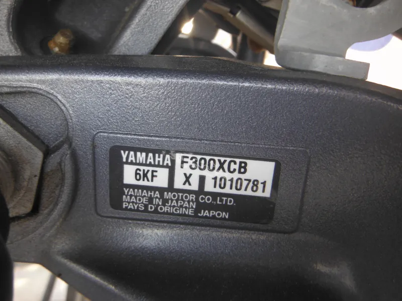 Slide: The Image of Yamaha F300XCB engine label on 2011 Ranger 2410 Bay Ranger, made in Japan. - 10