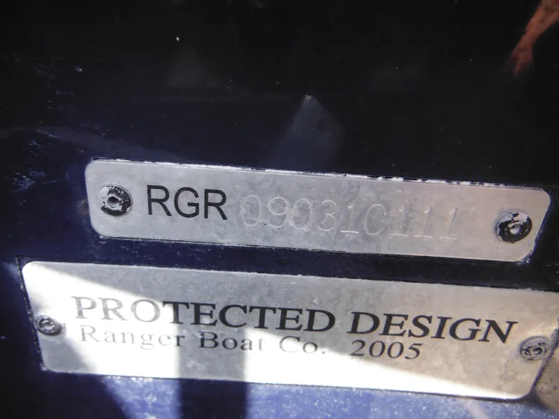 Slide: The Image of 2011 Ranger 2410 Bay Ranger boat identification plates, showcasing protected design details. - 15