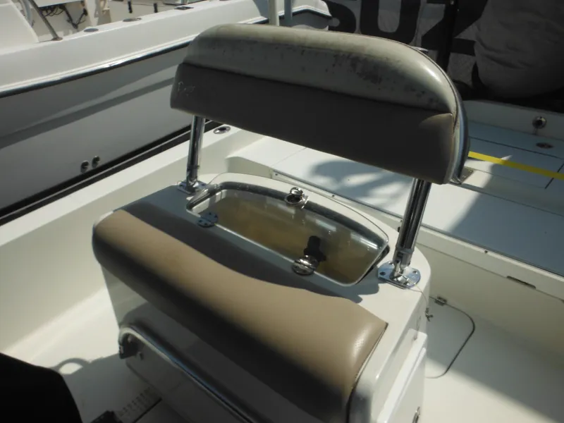 Slide: The Image of 2011 Ranger 2410 Bay Ranger boat seat with storage compartment. - 29