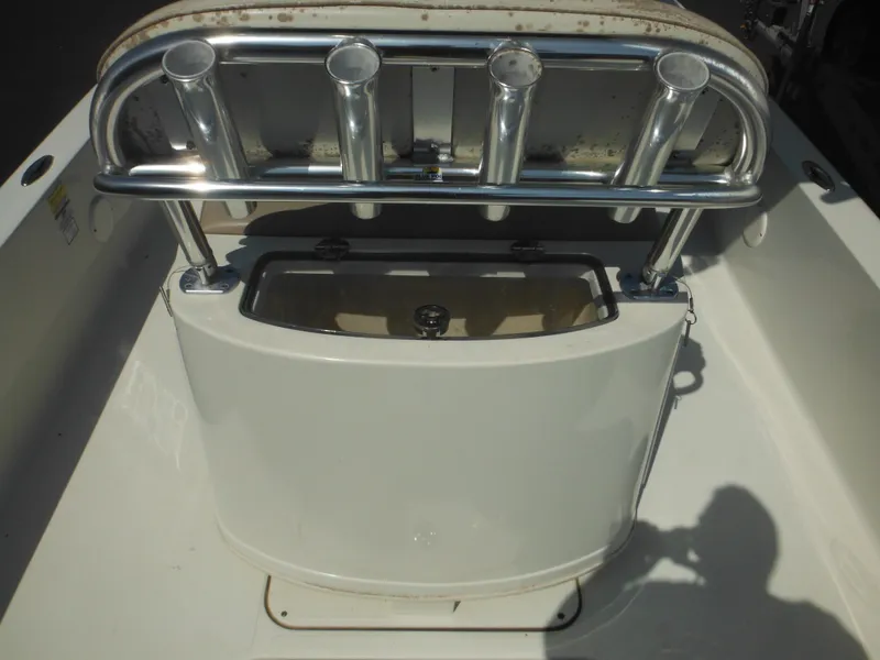 Slide: The Image of 2011 Ranger 2410 Bay Ranger boat with rod holders and storage compartment. - 30