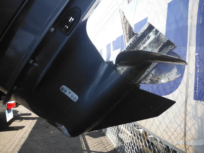 Slide: The Image of Outboard motor propeller of 2011 Ranger 2410 Bay Ranger boat, close-up view. - 35