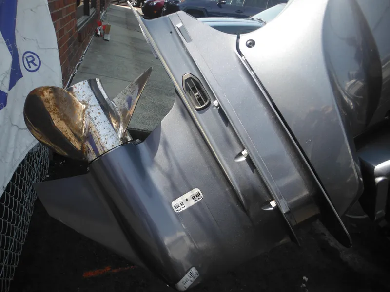 Slide: The Image of 2011 Ranger 2410 Bay Ranger boat propeller and motor close-up. - 36