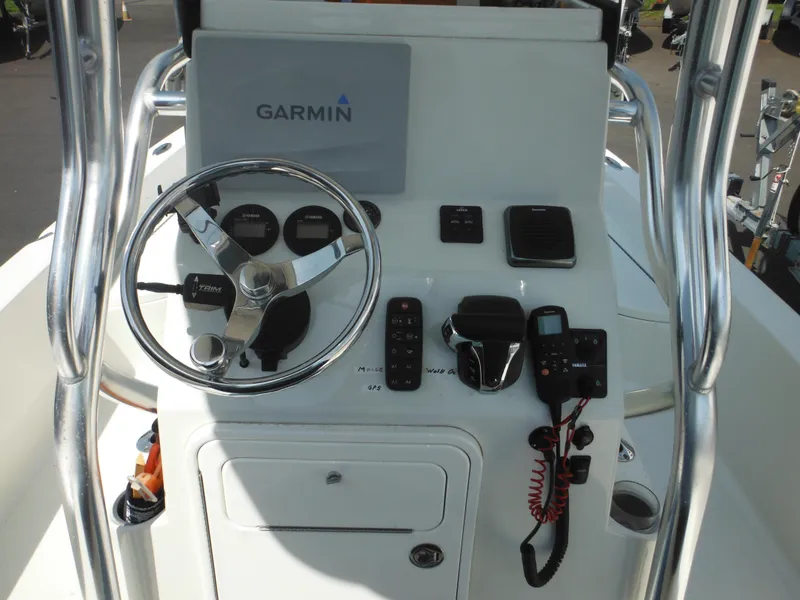 Slide: The Image of 2011 Ranger 2410 Bay Ranger boat console with Garmin navigation system and steering wheel. - 44