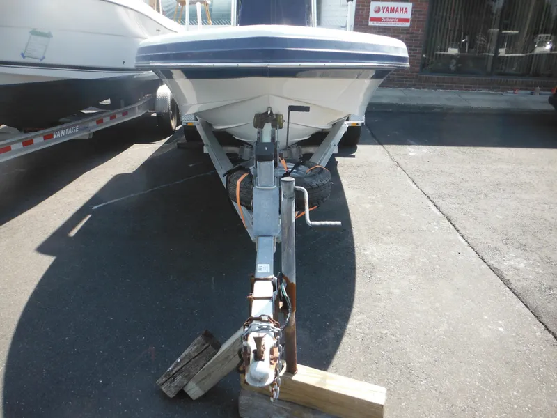 Slide: The Image of 2011 Ranger 2410 Bay Ranger boat on trailer, parked outdoors. - 6