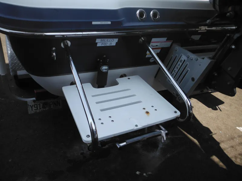 Slide: The Image of Rear view of 2011 Ranger 2410 Bay Ranger boat with swim platform and ladder. - 9