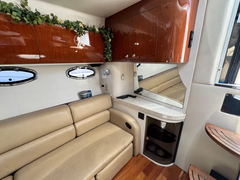 Slide: The Image of Luxurious interior of 2009 Regal Commodore 4060 yacht with elegant seating and decor. - 21