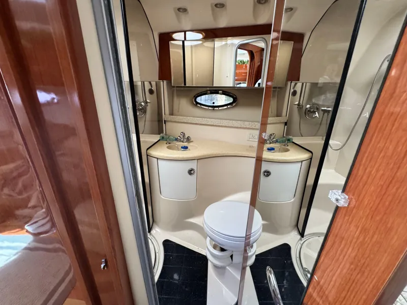 Slide: The Image of Interior of 2009 Regal Commodore 4060 yacht with TV and window view. - 23