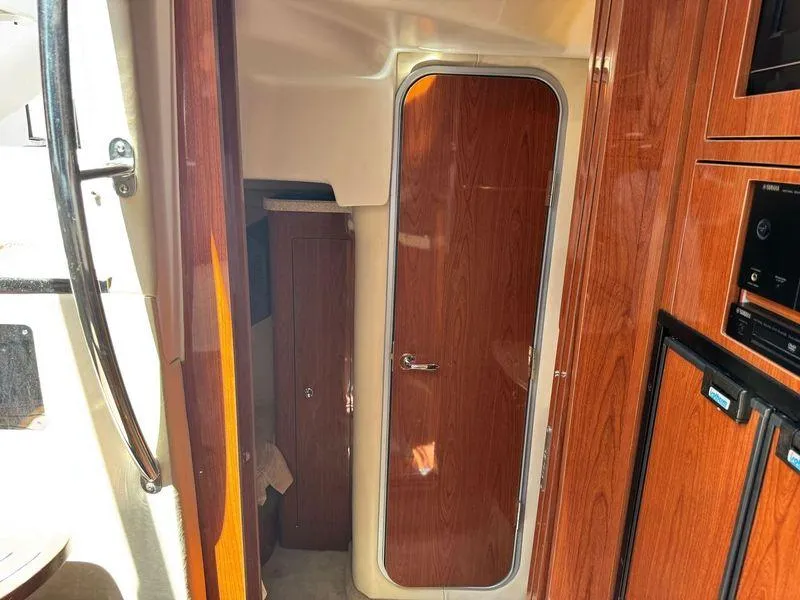 Slide: The Image of Compact bathroom in 2009 Regal Commodore 4060 yacht with toilet and shower. - 26