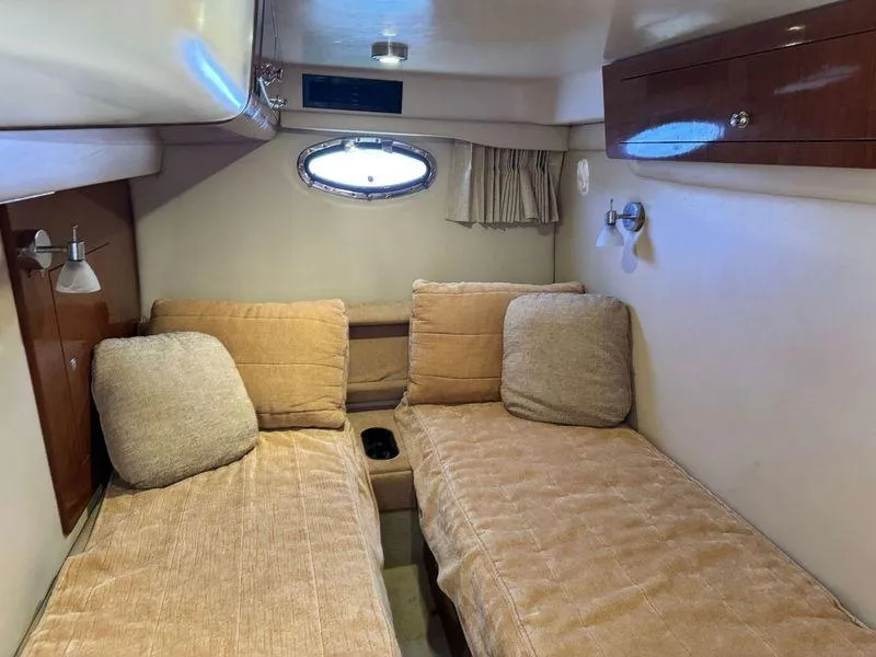 Slide: The Image of Luxurious bathroom in 2009 Regal Commodore 4060 yacht with elegant wood finish. - 28