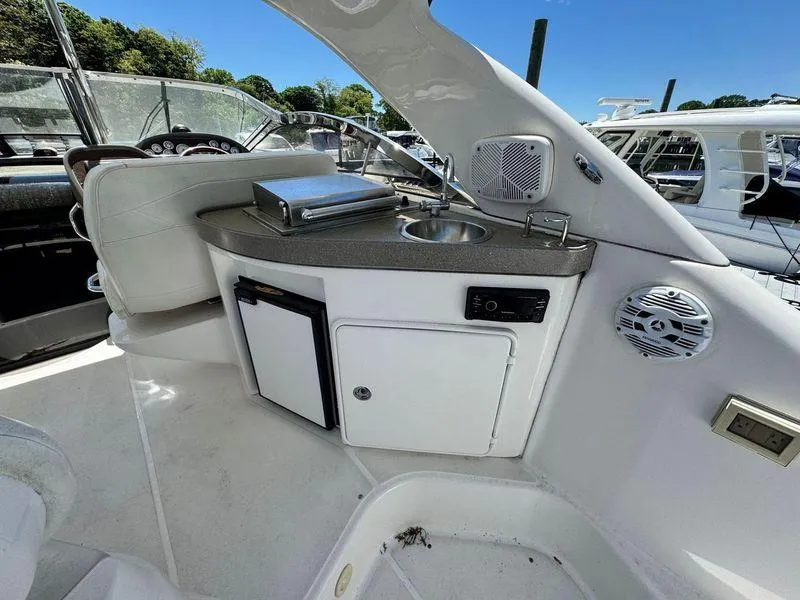 Slide: The Image of 2009 Regal Commodore 4060 boat seating area with custom mat, ocean view. - 8