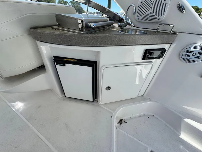 Slide: The Image of Luxury interior of 2009 Regal Commodore 4060 yacht with kitchenette and ocean view. - 9