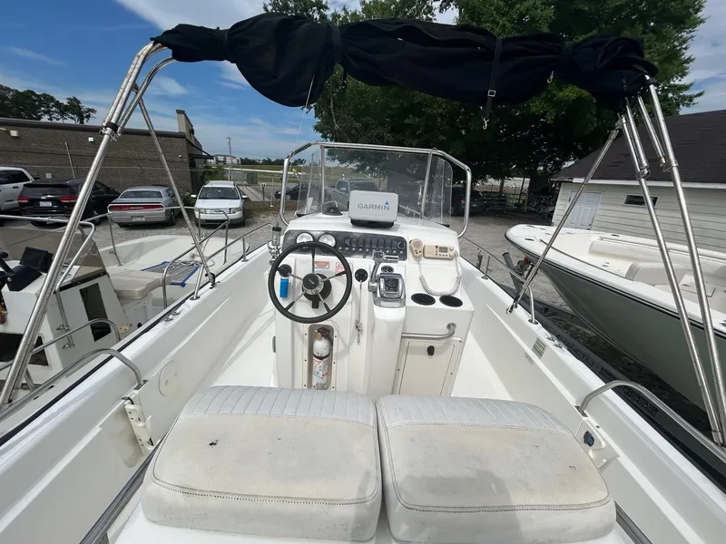 Slide: The Image of 2005 Boston Whaler 220 Dauntless boat on trailer with Mercury outboard motor. - 5