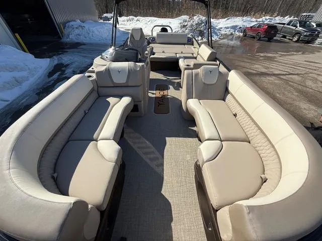 Slide: The Image of 2025 Tahoe Cascade 2385 Versatile Rear Lounger boat with spacious seating and modern design. - 19