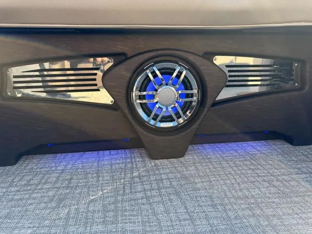 Slide: The Image of 2025 Tahoe Cascade 2385 Versatile Rear Lounger speaker with blue LED lighting. - 20