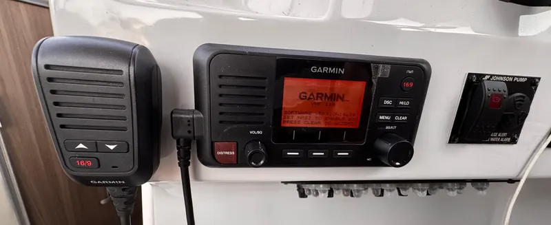 Slide: The Image of Garmin marine radio system on 2020 Regal 26XO boat dashboard. - 35