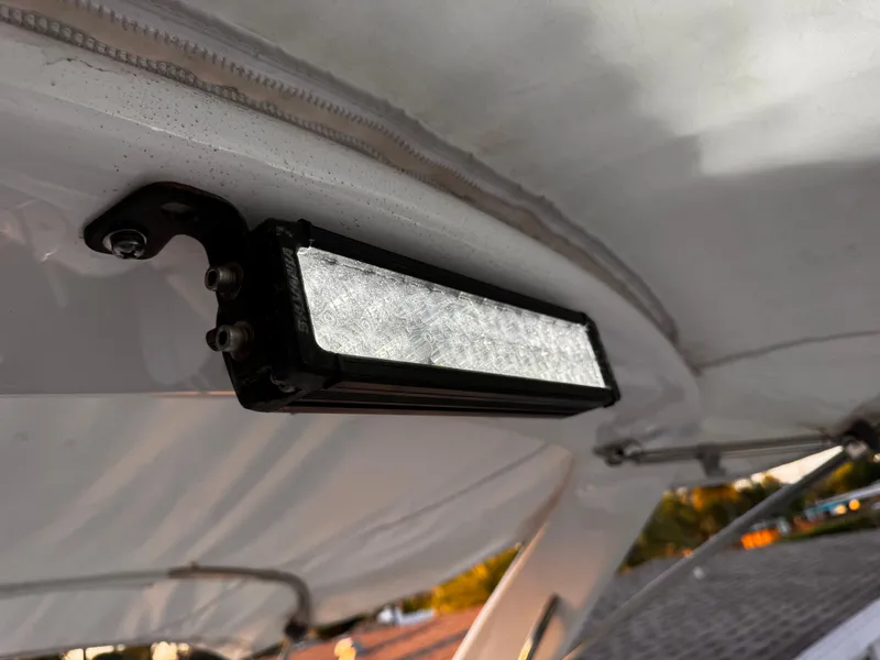 Slide: The Image of LED light fixture on a 2020 Regal 26XO boat canopy. - 40