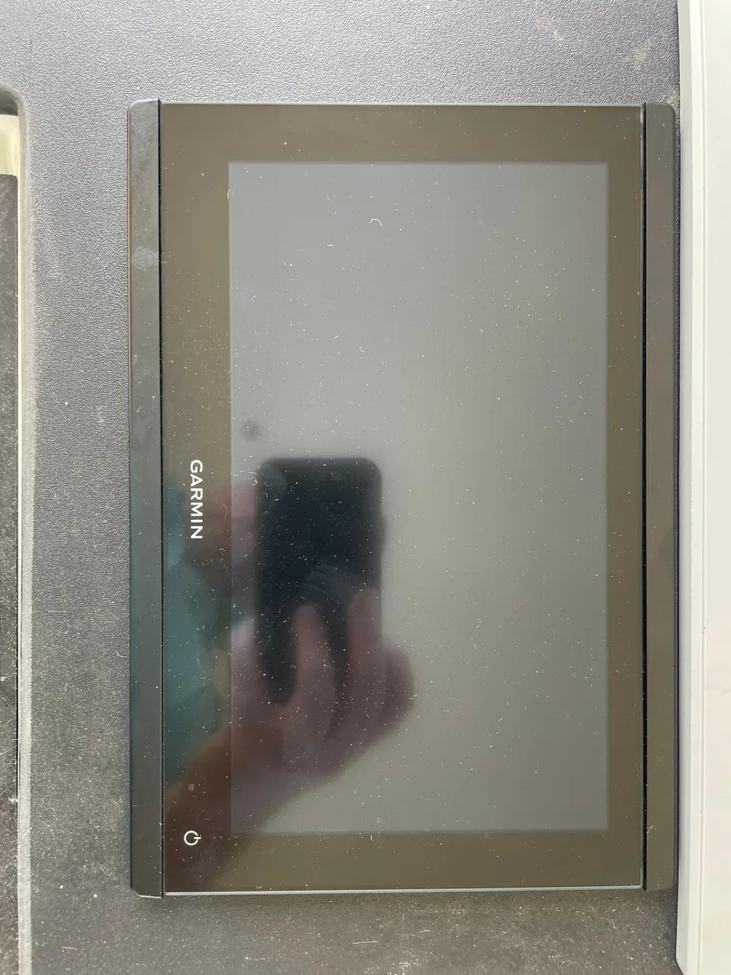 Slide: The Image of Garmin marine device on Hatteras 55 Convertible yacht, 1988 model. - 26