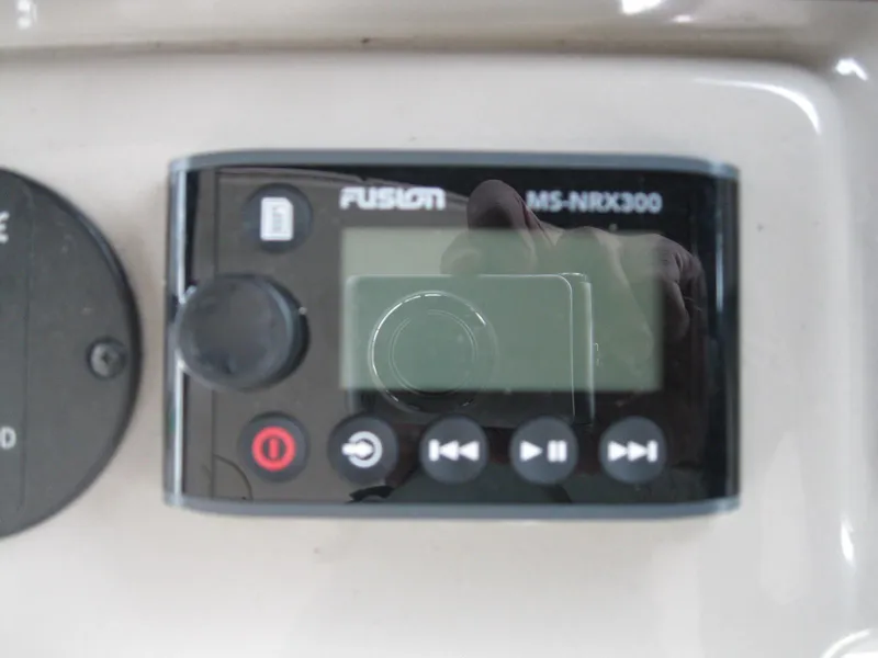 Slide: The Image of Fusion MS-NRX300 marine stereo controller on 2008 Sea Ray 330 Sundancer. - 27