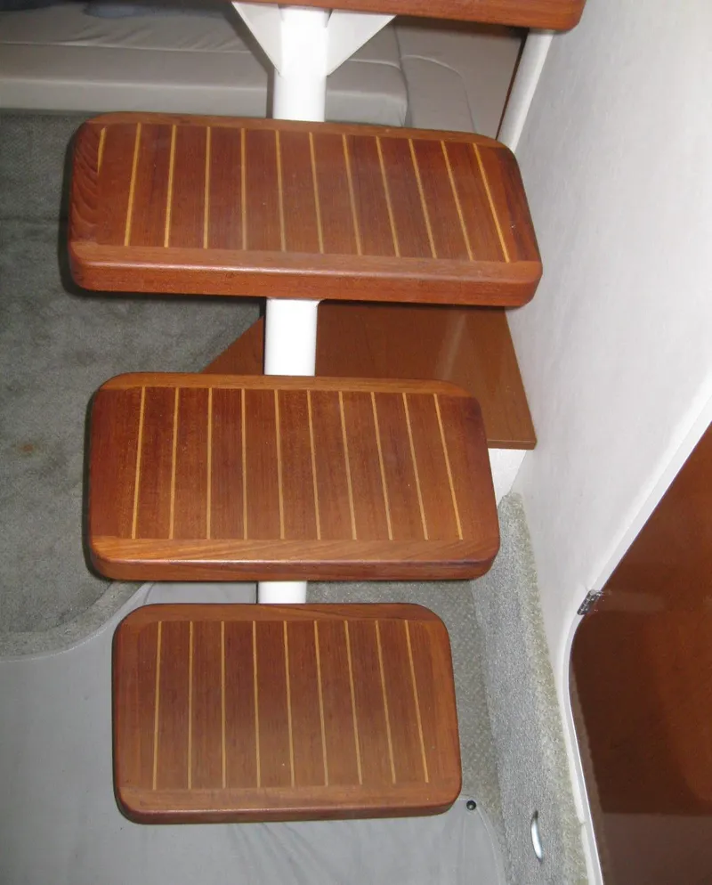 Slide: The Image of Wooden steps inside 2008 Sea Ray 330 Sundancer yacht, featuring sleek design and craftsmanship. - 44