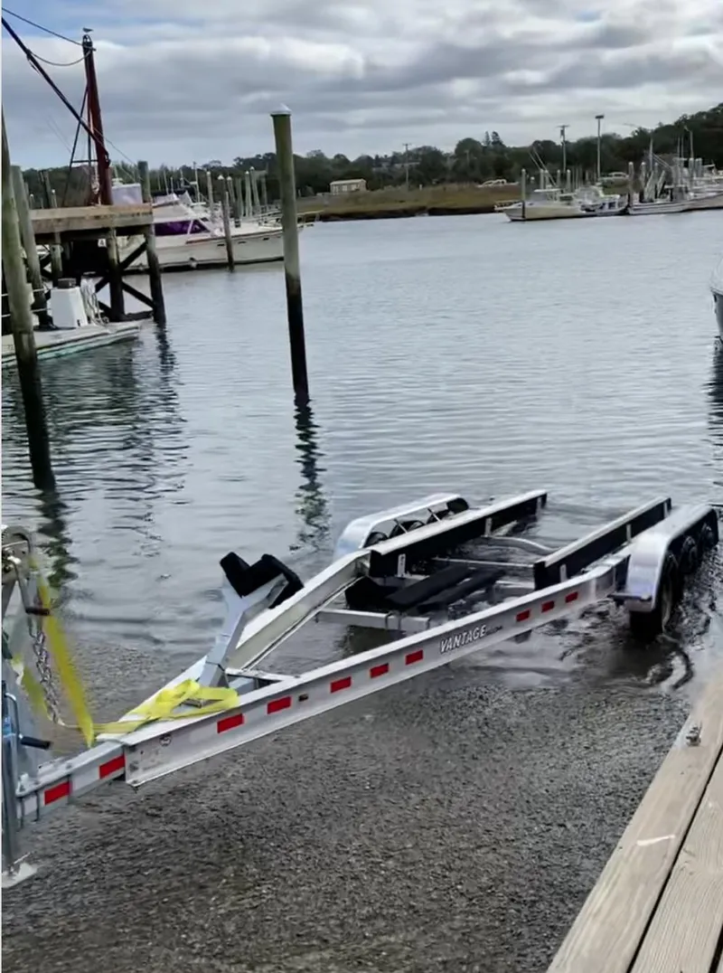 Slide: The Image of Boat trailer at a marina, ready for a 2015 Sea Ray 280 Sundancer. - 28