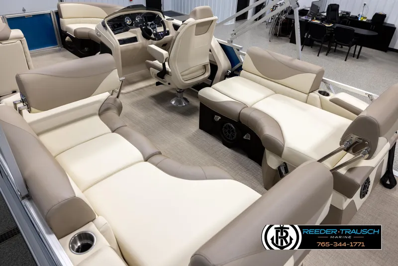 Slide: The Image of Luxurious 2025 Avalon LSZ QLS boat interior with plush seating and modern dashboard. - 11