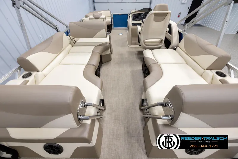 Slide: The Image of Luxurious interior of 2025 Avalon LSZ QLS pontoon boat with beige seating. - 16