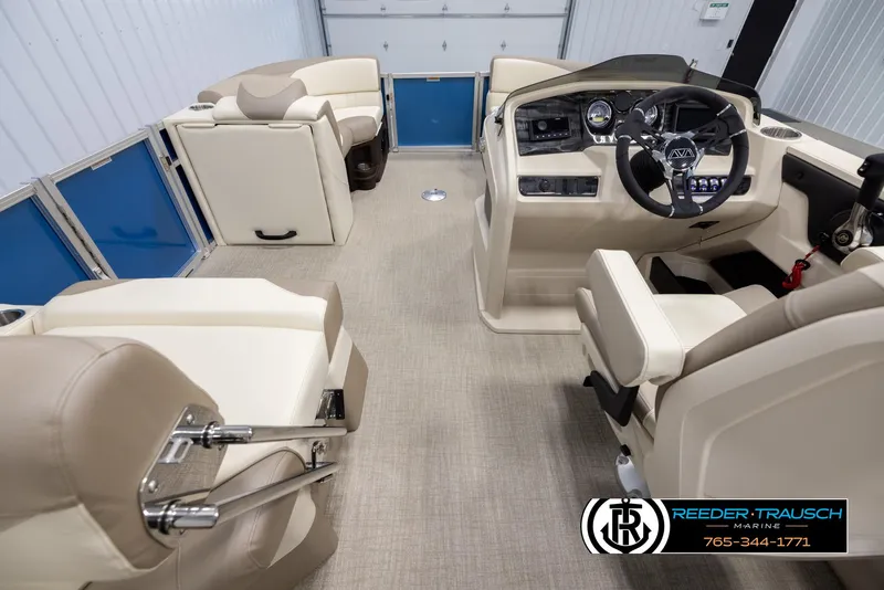 Slide: The Image of Interior of 2025 Avalon LSZ QLS pontoon boat with beige seating and modern dashboard. - 17