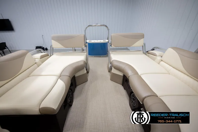 Slide: The Image of Luxurious interior of 2025 Avalon LSZ QLS pontoon boat with beige seating. - 29