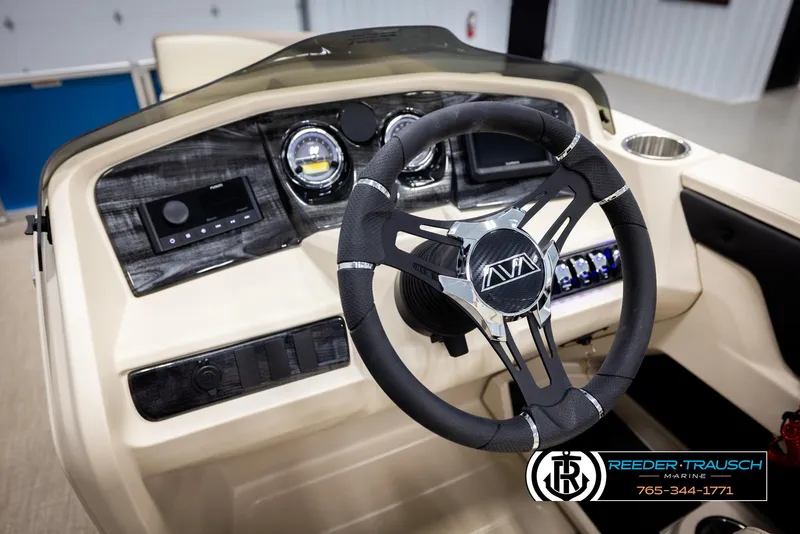 Slide: The Image of Steering console of 2025 Avalon LSZ QLS boat with modern controls and sleek design. - 32