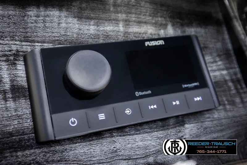 Slide: The Image of 2025 Avalon LSZ QLS Fusion Bluetooth audio system with control panel and buttons. - 34