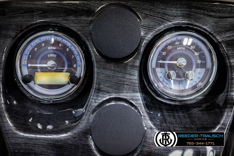 Slide: The Image of Dashboard of 2025 Avalon LSZ QLS with RPM and MPH gauges, Reeder-Trausch Marine logo. - 35