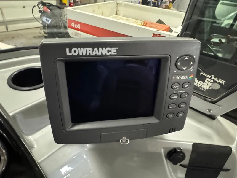Slide: The Image of Lowrance fish finder on 2018 Tracker Pro Guide V-16 WT boat dashboard. - 9