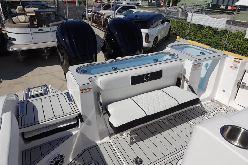 Slide: The Image of Livewell on 2025 Sea Fox 328 Commander boat, open lid, clean interior. - 10
