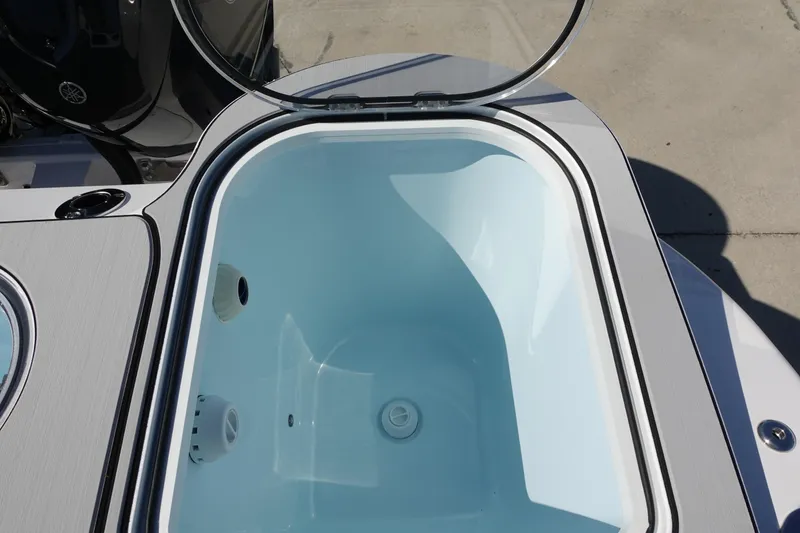 Slide: The Image of Sea Fox 328 Commander 2025 boat with dual outboard motors and spacious livewell. - 12