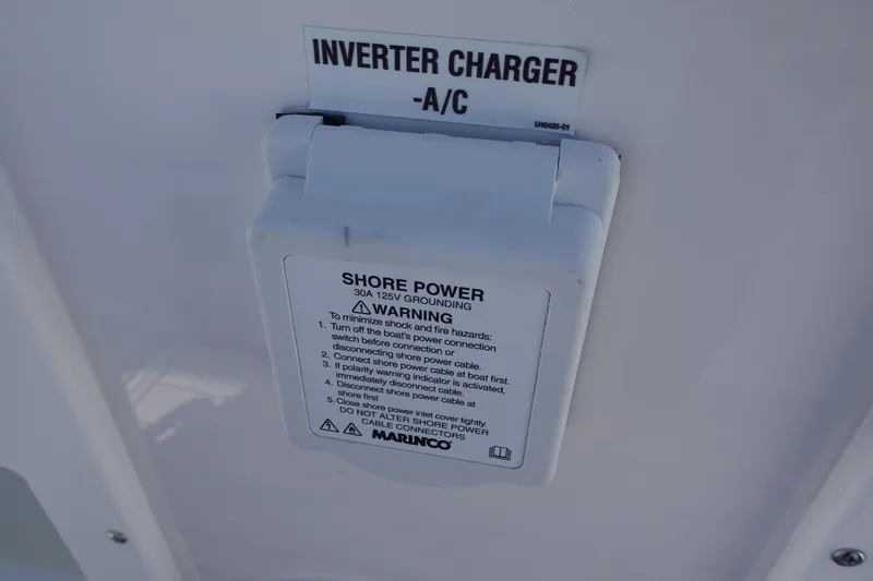 Slide: The Image of 2025 Sea Fox 328 Commander boat deck with speakers and sleek design. - 19