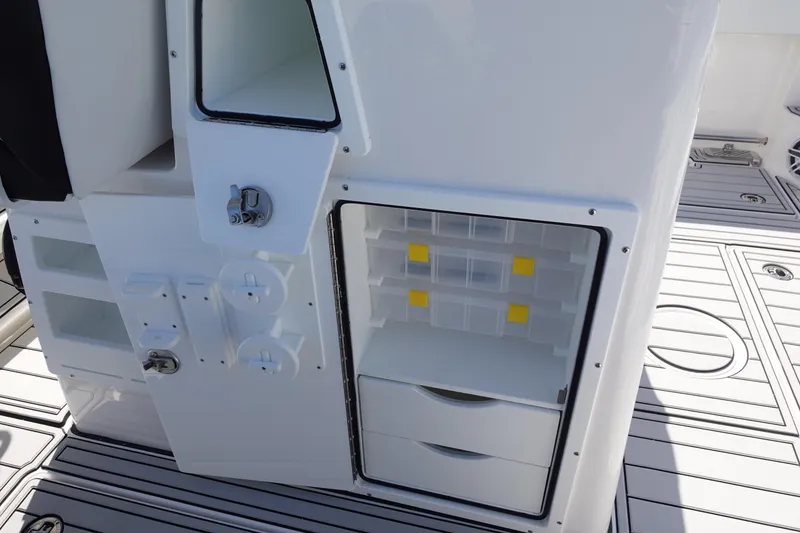Slide: The Image of 2025 Sea Fox 328 Commander boat interior with sleek flooring and built-in speaker system. - 20