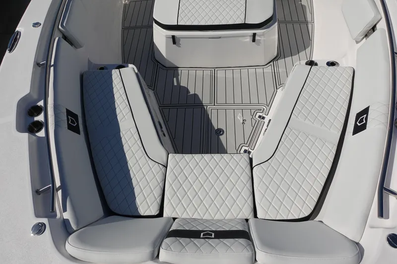 Slide: The Image of 2025 Sea Fox 328 Commander storage compartment with open lid and hydraulic support. - 26